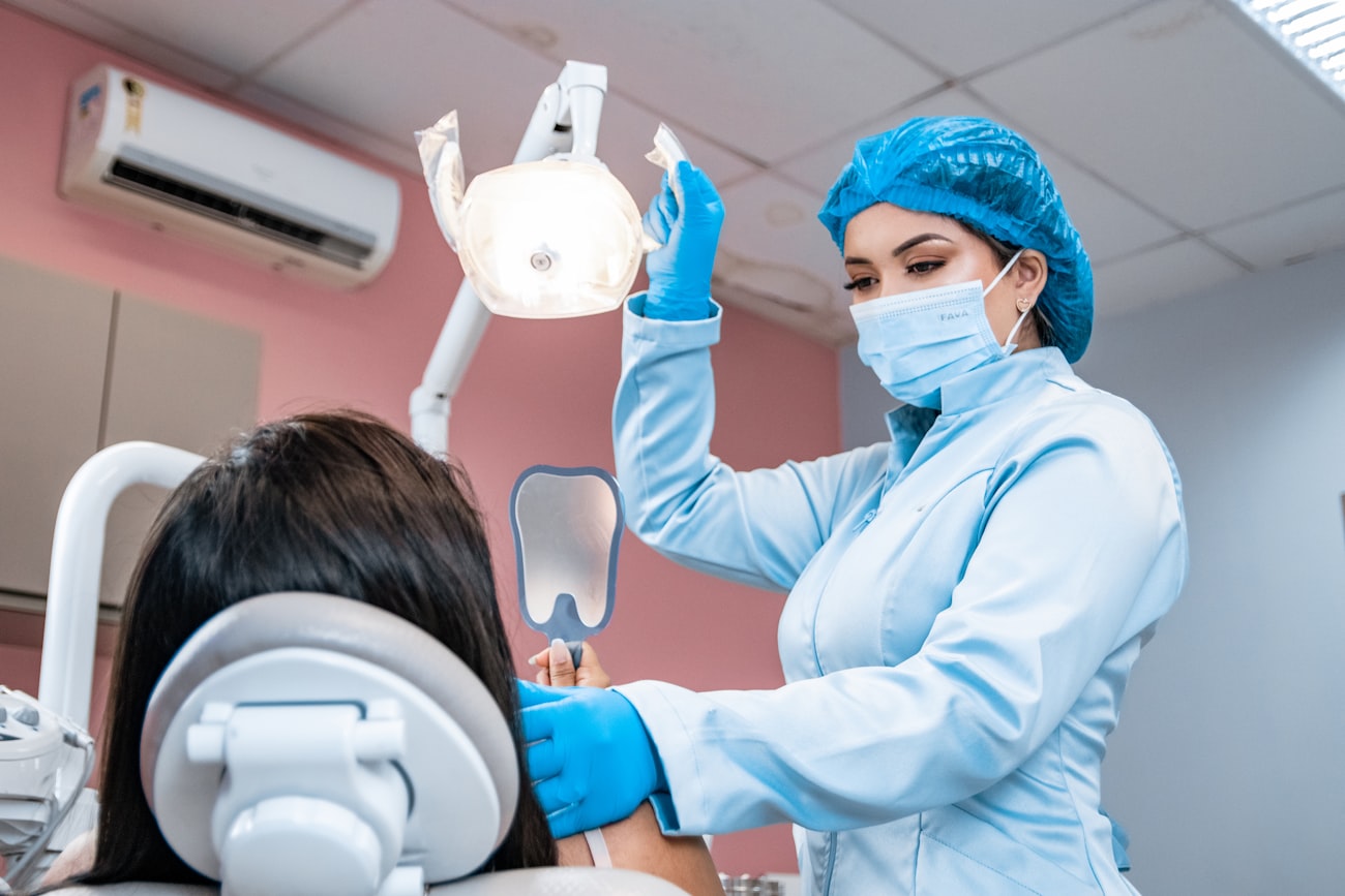 Dental associate treating a patient