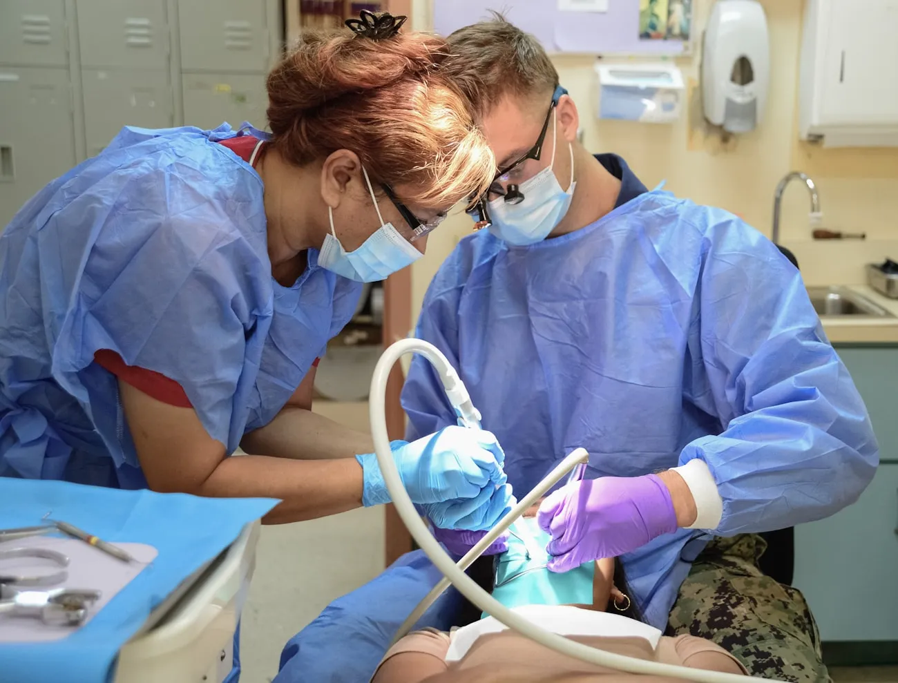 Dentists working together on a patient